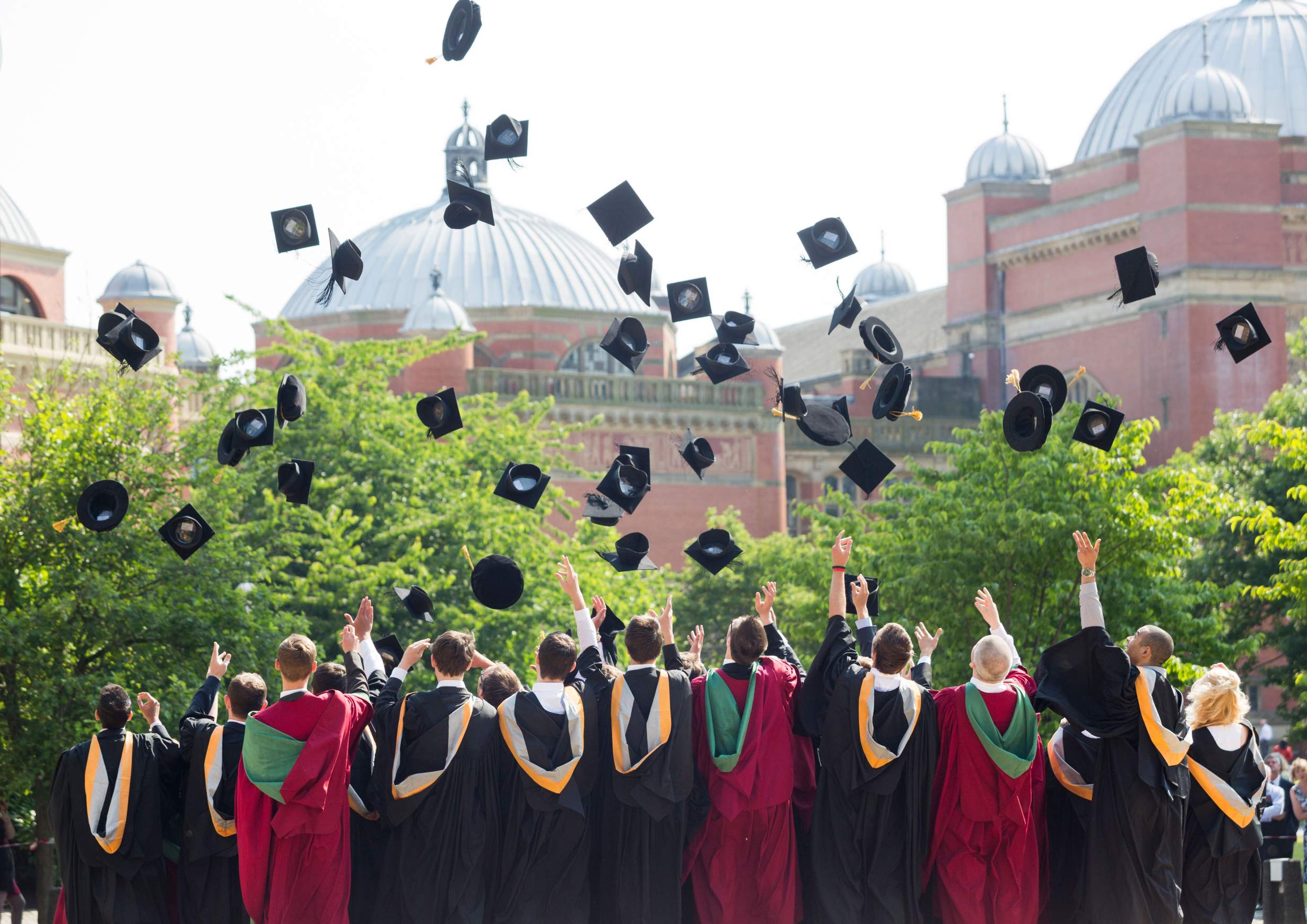 Graduates throwing their caps at the University of Birmingham