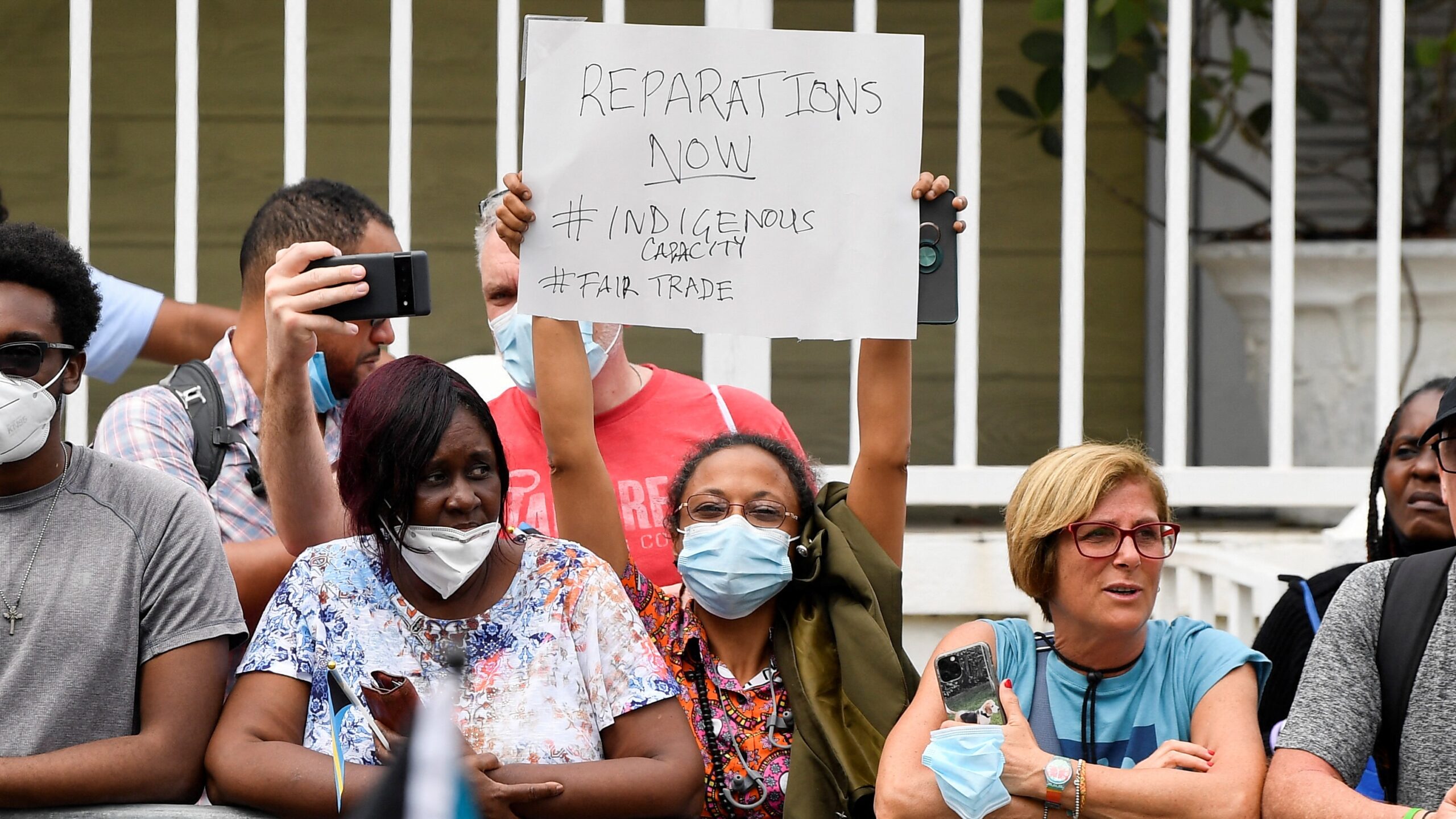 Woman protests for Reparations