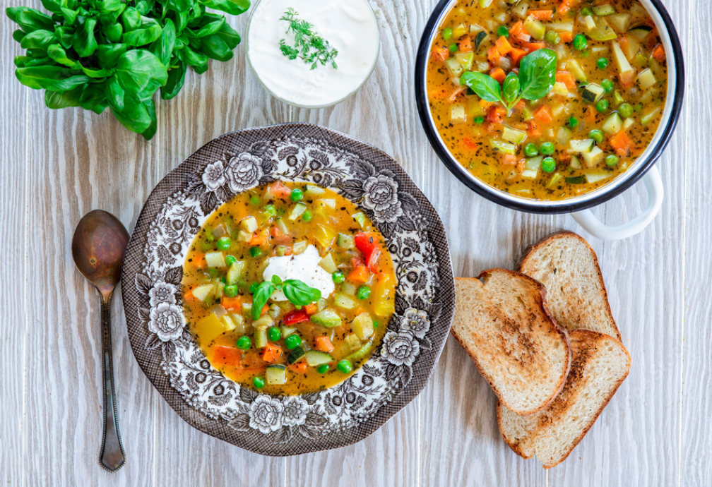 Hearty Vegetable Soup dishes on a table.